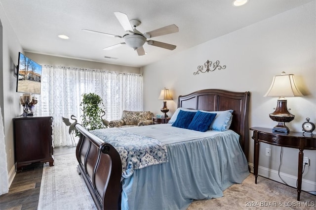 bedroom featuring ceiling fan and wood-type flooring