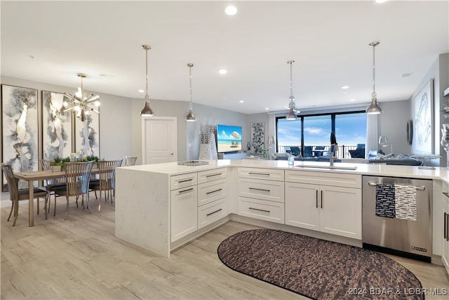 kitchen with dishwasher, white cabinetry, light hardwood / wood-style flooring, and hanging light fixtures