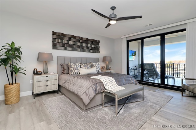 bedroom with access to outside, ceiling fan, and light wood-type flooring