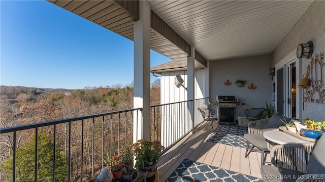 balcony featuring area for grilling