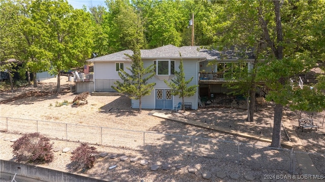 view of front of house featuring a wooden deck