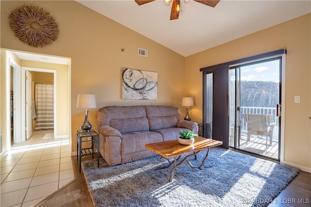 611 Lazy Days Rd Unit C9, Osage Beach, MO 65065 - living area featuring a ceiling fan, lofted ceiling, baseboards, and light wood-type flooring