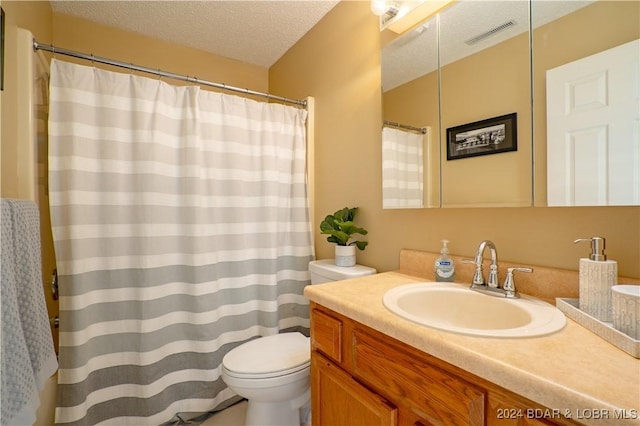 611 Lazy Days Rd Unit C9, Osage Beach, MO 65065 - full bath featuring vanity, toilet, a textured ceiling, and curtained shower