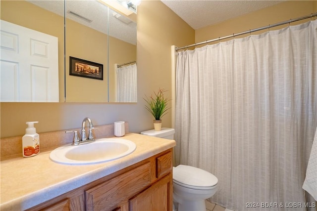 611 Lazy Days Rd Unit C9, Osage Beach, MO 65065 - bathroom featuring toilet, vanity, and a textured ceiling