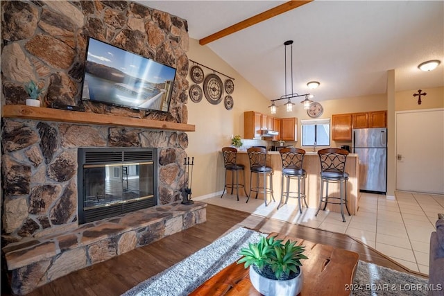 611 Lazy Days Rd Unit C9, Osage Beach, MO 65065 - living area featuring a fireplace, light wood-type flooring, and baseboards