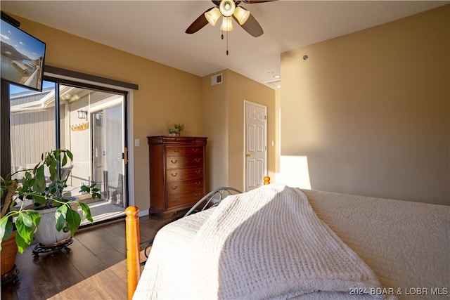 611 Lazy Days Rd Unit C9, Osage Beach, MO 65065 - bedroom featuring access to exterior, wood finished floors, multiple windows, and a ceiling fan