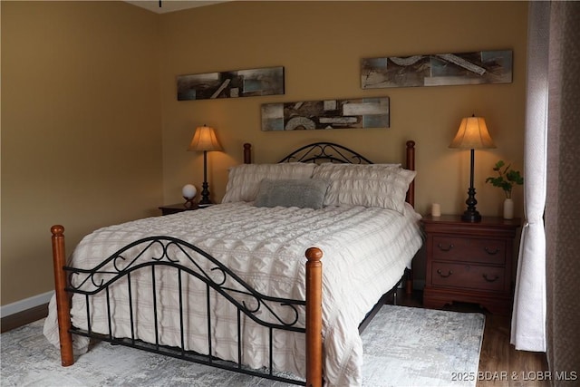 611 Lazy Days Rd Unit C9, Osage Beach, MO 65065 - bedroom featuring wood finished floors and baseboards
