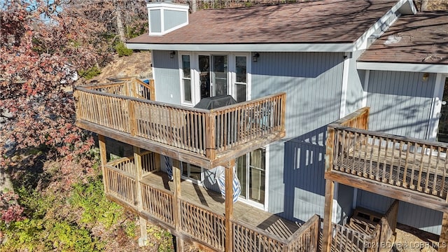 rear view of house with a balcony