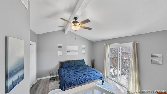 bedroom featuring vaulted ceiling with beams, ceiling fan, and light hardwood / wood-style floors