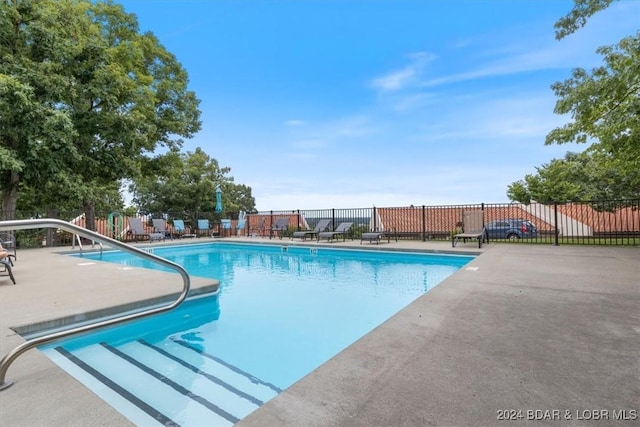 view of pool with a patio