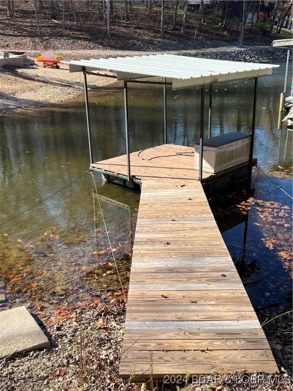 dock area featuring a water view