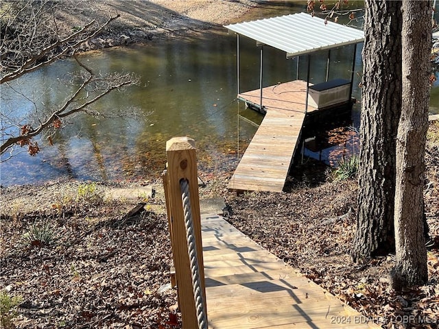 view of dock with a water view