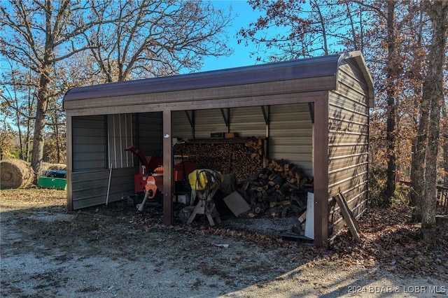 view of outdoor structure with a carport