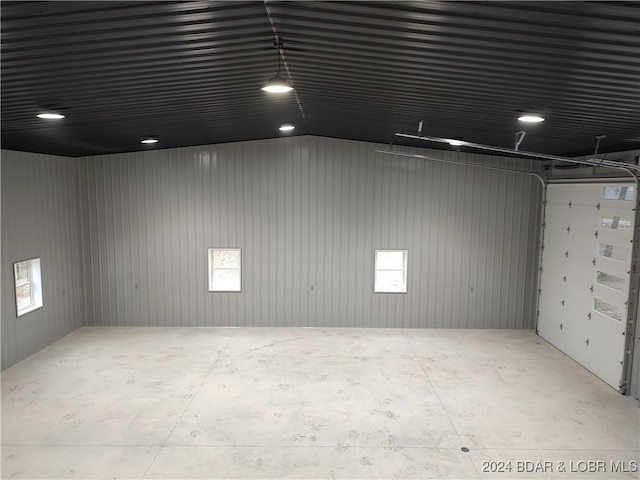 garage with wood walls