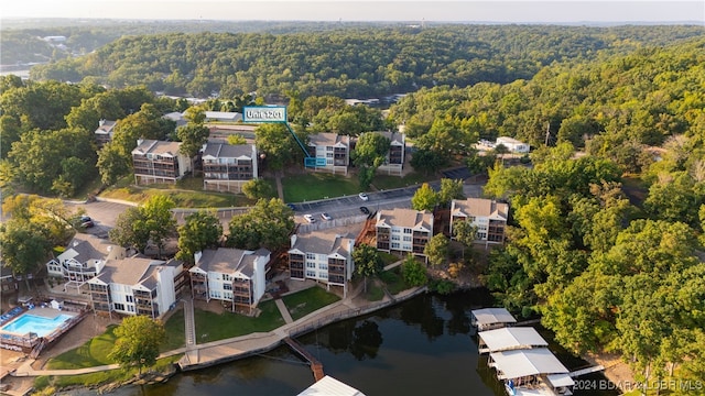 drone / aerial view with a water view