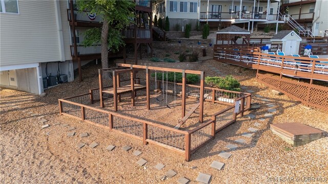 exterior space featuring a wooden deck