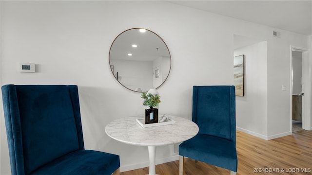 living area featuring hardwood / wood-style flooring