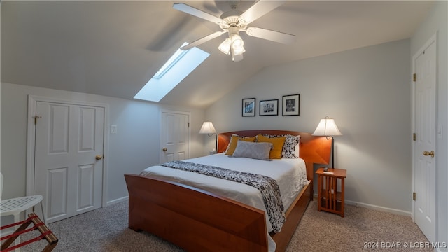 bedroom with carpet flooring, ceiling fan, and lofted ceiling