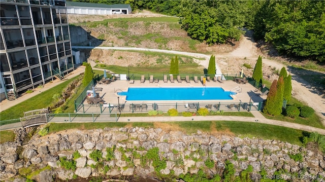 view of swimming pool with a patio area