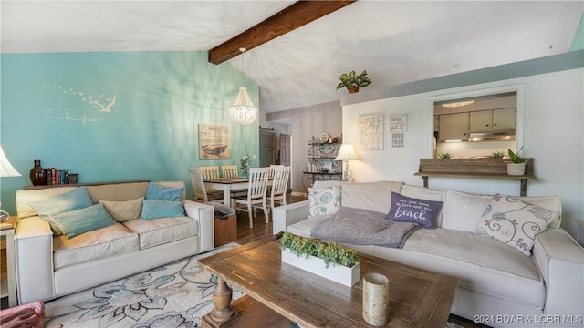 living room with hardwood / wood-style floors and lofted ceiling with beams