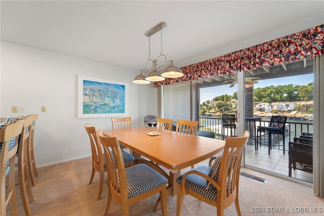 view of carpeted dining room