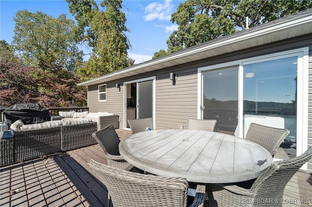 deck with an outdoor hangout area