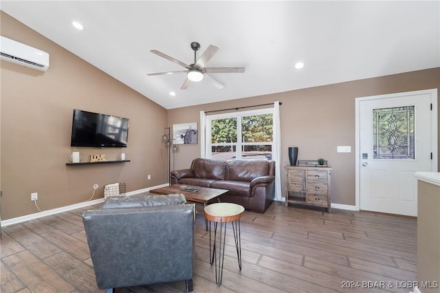 living room featuring vaulted ceiling, an AC wall unit, dark hardwood / wood-style floors, and ceiling fan