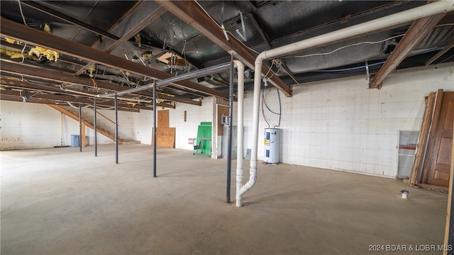 basement featuring electric water heater