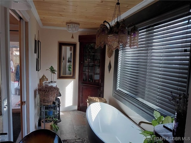 dining area with ornamental molding and wooden ceiling