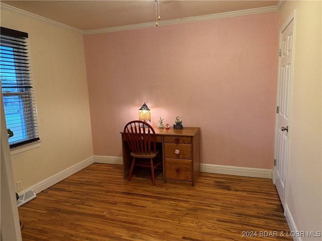 unfurnished office with hardwood / wood-style flooring and ornamental molding