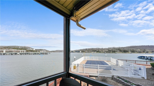 view of dock featuring a water view