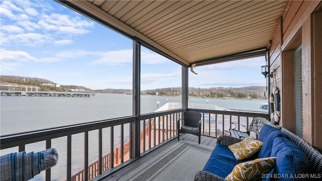 deck featuring a water view