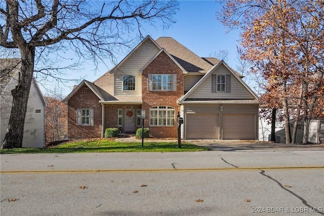 view of front of home with a front lawn