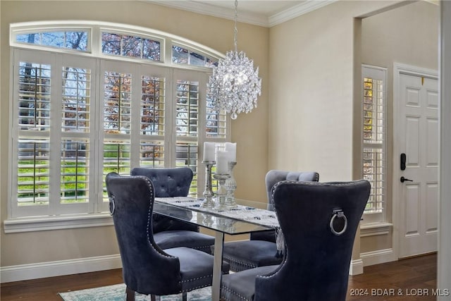 dining area featuring dark hardwood / wood-style flooring, an inviting chandelier, and a healthy amount of sunlight