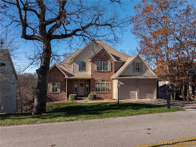 view of front of house with a front lawn