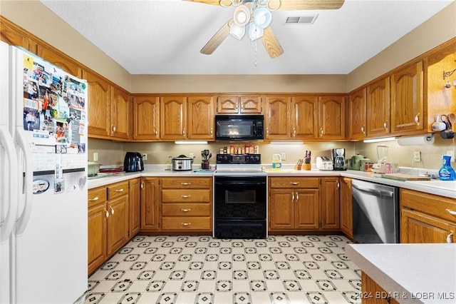 kitchen with ceiling fan and black appliances