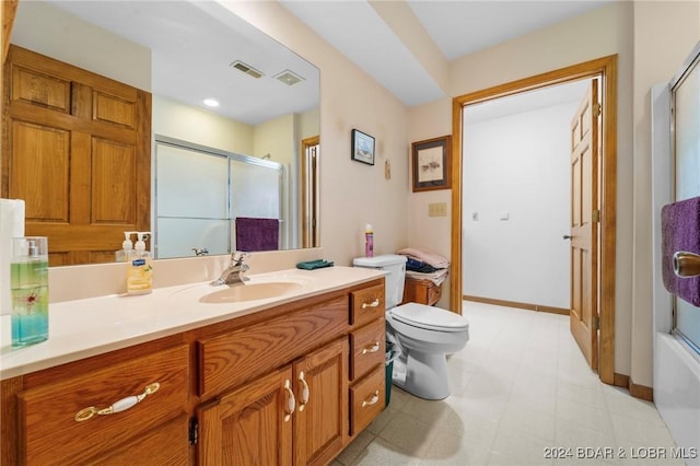 full bathroom featuring vanity, toilet, and enclosed tub / shower combo