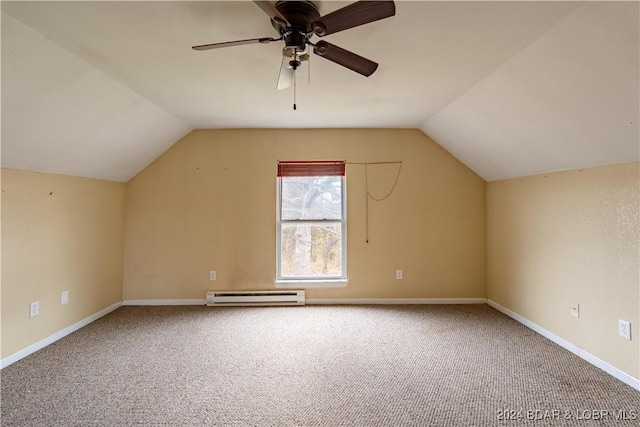 additional living space with ceiling fan, carpet, a baseboard radiator, and lofted ceiling