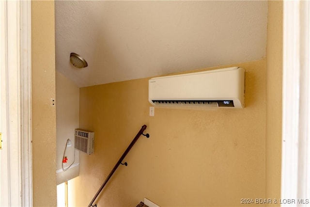 interior space with a wall mounted AC