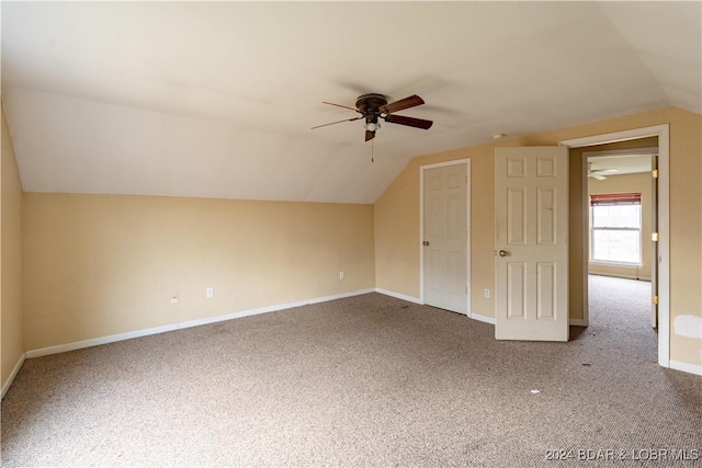 bonus room with carpet, vaulted ceiling, and ceiling fan