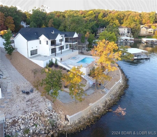 drone / aerial view featuring a water view