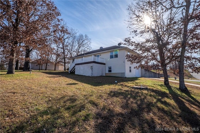 exterior space with a yard and a deck