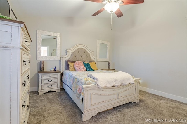 carpeted bedroom featuring ceiling fan and baseboards
