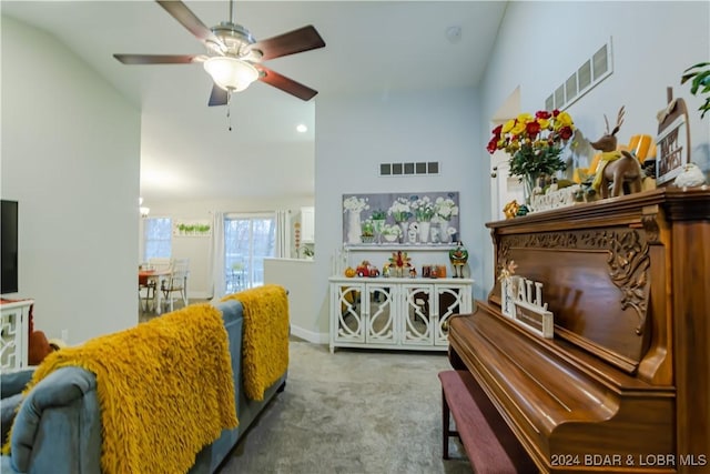 miscellaneous room with carpet, vaulted ceiling, and ceiling fan