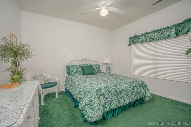 bedroom with ceiling fan and carpet