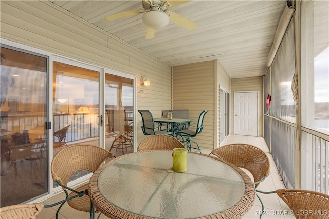 sunroom / solarium with ceiling fan