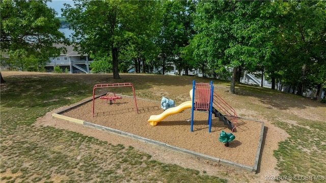 view of play area with a yard