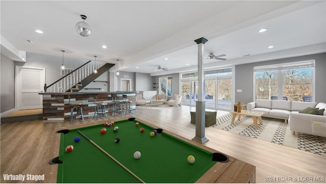 rec room with ceiling fan, light wood-type flooring, and billiards