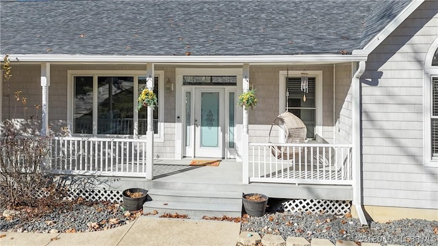 doorway to property with a porch