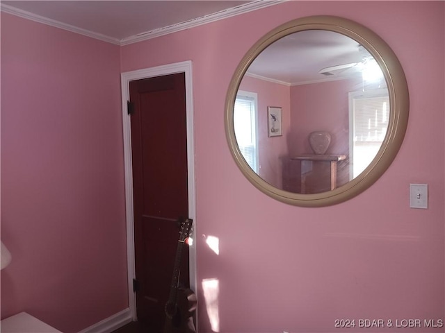 bathroom with ornamental molding